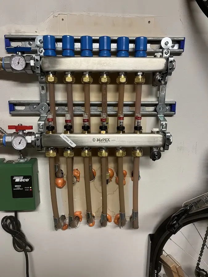 Plumber performing Water Heater Repair at a residential property in Emeryville